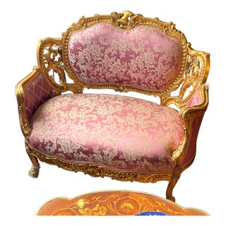 French Rococo Loveseat – Pink Damask Upholstery, Ornate Gold Leaf Frame & Carved Floral Details For Sale