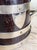 A beautiful antique circa 1888 oak cup with applied metal rims, frame, and shield, engraved to read: R. M. A. Sports 1888...