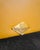 The Lyra armchair by Poltrona Frau is upholstered in a magnificent, warm Giallo yellow leather, displaying a beautiful...