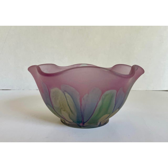 This beautiful hand-painted art glass bowl by Nouveau Glass Co. features a softly ruffled rim and a dreamy palette of...