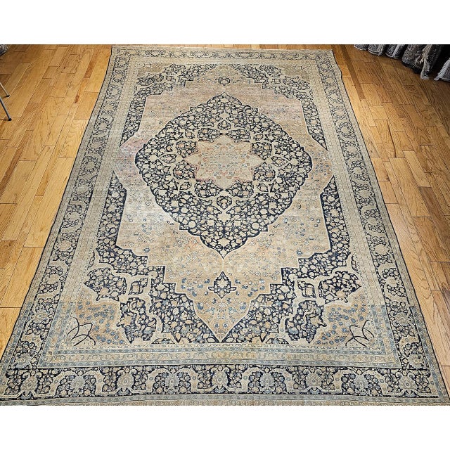 "An extraordinary example of 19th-century Persian artistry, this magnificent Tabriz carpet hails from the renowned...