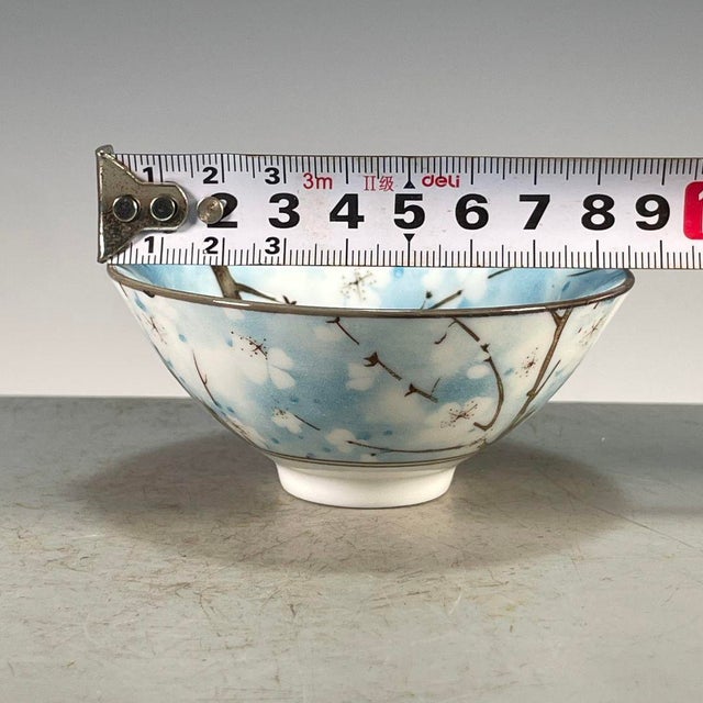 A charming Chinese blue and white porcelain bowl. The exterior and interior are beautifully hand-painted with a...