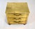A striking three-drawer brass-clad campaign chest manufactured by Sarreid Ltd., handcrafted in Spain in the 1970s. An...