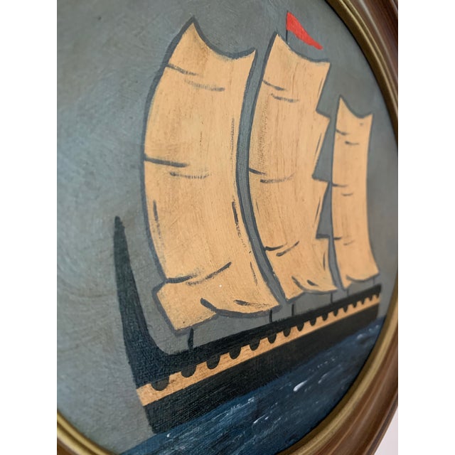 A moody and richly layered seascape featuring a striking black vessel beneath an olive-grey sky, illuminated by glowing...
