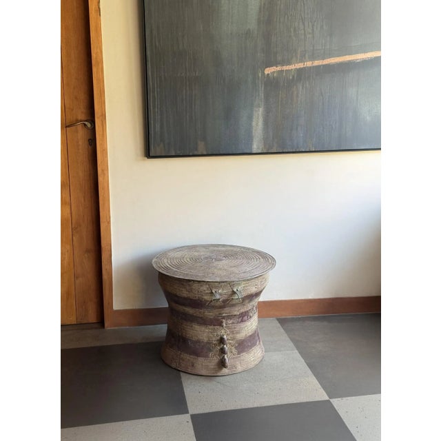 A striking fusion of ancient tradition and sculptural design, this cast bronze rain drum is handcrafted by master artisans...
