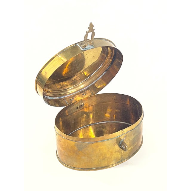 Vintage brass trinket box with natural horn cabochon on top. Handsome accessory. Approx 6" x 4.5" x 3.5"