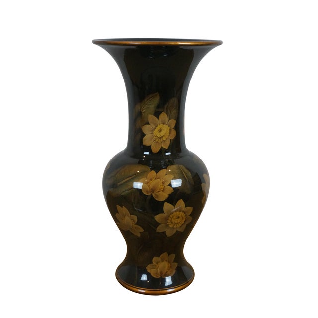 Vintage Chinese Black & Gold Lacquered Chinoiserie Lotus Flower Vase. Features a bulbous shape with flared mouth. The vase...