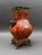 Mark Roberts Floral Porcelain & Bronze Footed Vase. Measures approximately 7 1/2" long, 6" wide, 13.5" high.