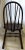 Beautiful, Windsor style, spindled wood rocking chair with wood dowel back. The wood is beautiful and the frame is sturdy....