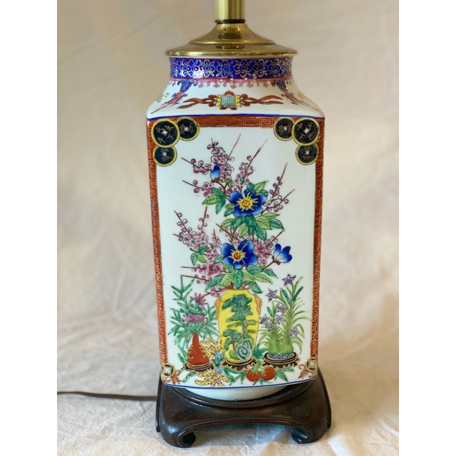 This handpainted Asian table lamp, features a beautiful floral design on fine porcelain. This exquisite piece combines...