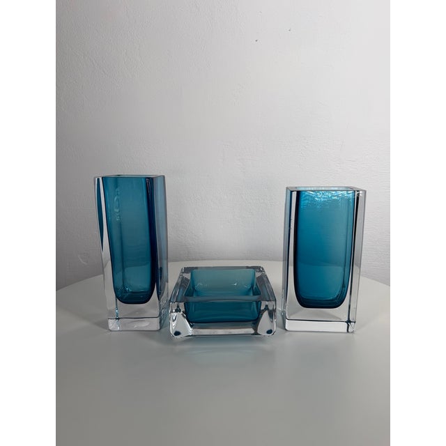 A striking set of three signed art-glass pieces designed by Göran Wärff for Kosta Boda, one of Sweden’s most renowned...