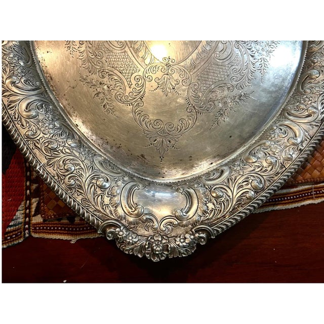 Large and heavy engraved silver tray from the 1930s. Makers marks on underside. Will polish up beautifully.