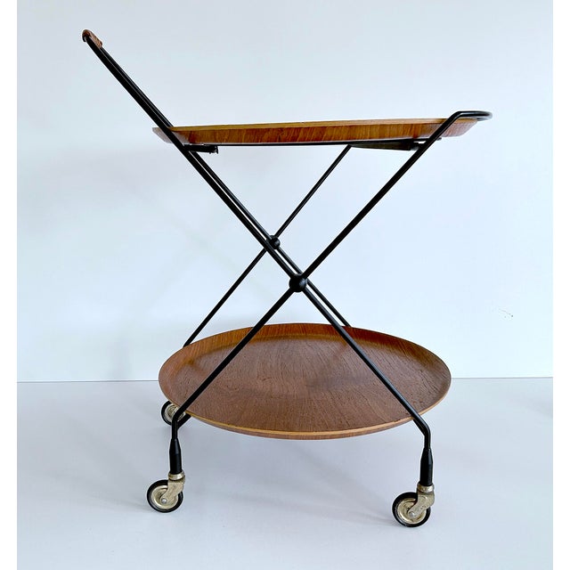 Vintage swedish scandinavian serving cart by jie gantofta featuring a double leveled foldable black steel structure with 2...