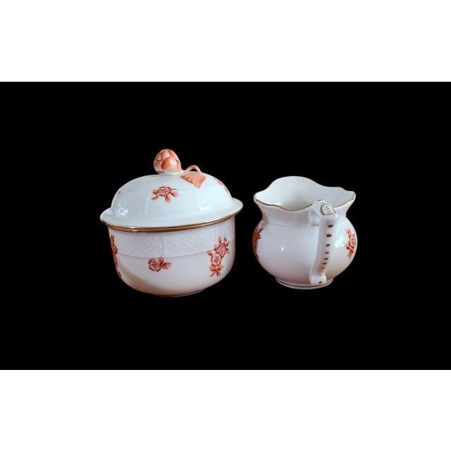 This vintage Herend porcelain set from the 1950s features a creamer and sugar bowl in the Eton Rust pattern. The pieces...