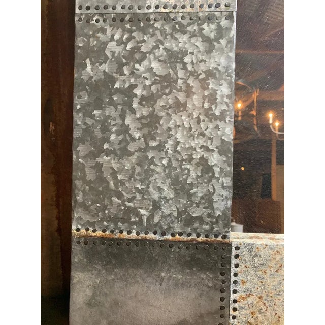 Modern Industrial Square Mirror – Riveted Tin Metal Frame Product Description: Add bold character and industrial flair to...