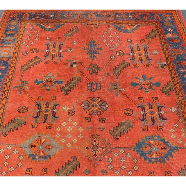 Antique Turkish Oushak Colorful Rug With All-Over Design In Salmon and Blue's. Keivan Woven Arts; rug EN-141817, Country...