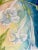 A contemporary colorful floral painting. This uplifting art piece would look great in a variety of settings. A dramatic,...
