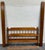 This is an absolutely stunning vintage Early American Colonial full-size Jenny Lind spindle bed featuring beautifully...