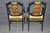 Elevate your dining or entertaining space with this exceptional set of 8 fine quality ebonized and gilded neoclassical...