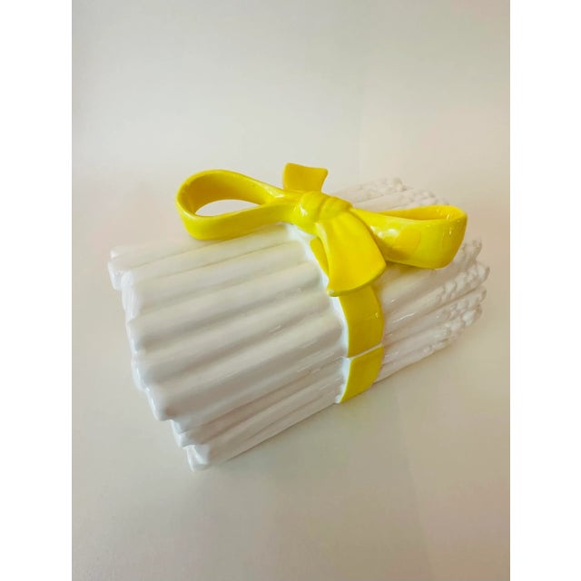 Vintage 1975 white ceramic Trompe L’Oeil asparagus box with bright yellow bow, made by Fitz and Floyd. In great condition....