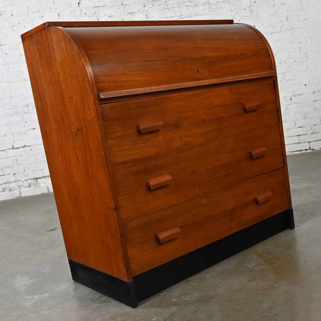 Handsome vintage Scandinavian Modern teak roll top desk or dresser. Beautiful condition, keeping in mind that this is...