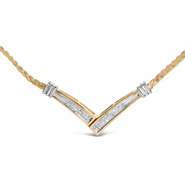 This stunning 10K yellow and white gold pendant necklace features a flared V shaped pendant inset with two rows of...