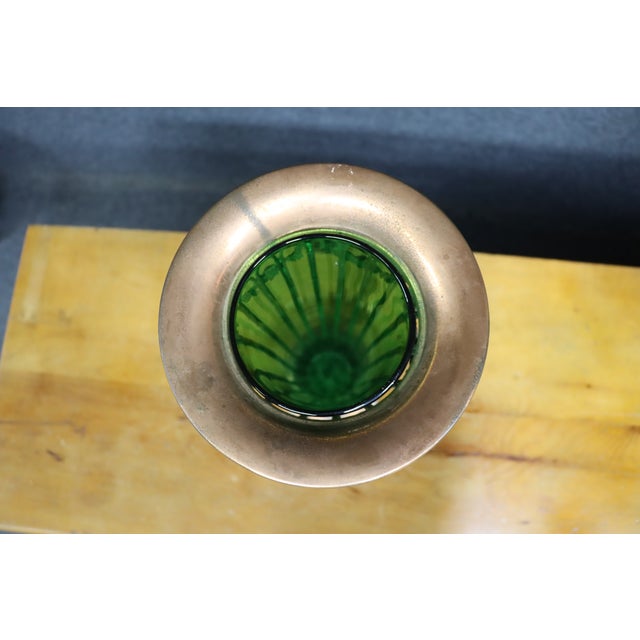 Art Nouveau style emerald glass fluted vase with barbell accents and copper base/top.