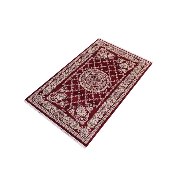 Designed with mesmerizing intricacy and gorgeous color palette, this hand-knotted masterpiece demonstrates the beauty and...