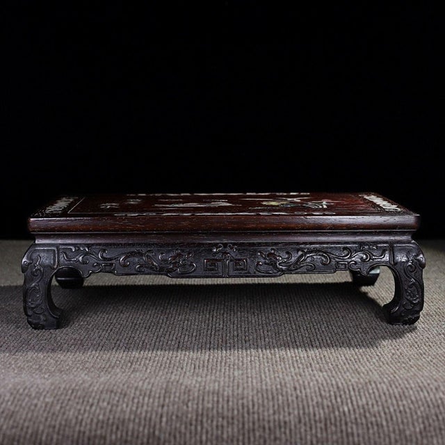 A beautiful vintage Chinese low table (Kang table), crafted from dark, richly grained hardwood (labeled as Little Leaf Red...