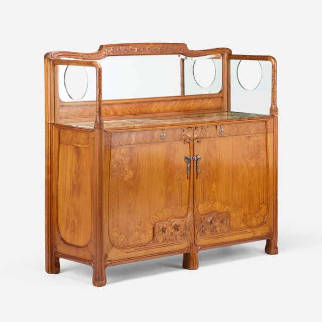 An impressive 19th-century antique sideboard, dating to circa 1880, distinguished by its substantial proportions, richly...