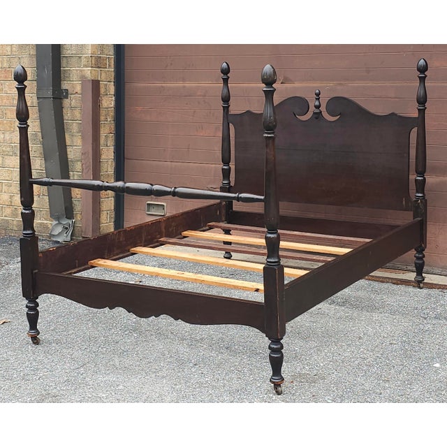 A Victorian Mahogany Poster Full Size bedframe on wheels Measure 79.5" in depth, 57" in width and 56" in height to the top...