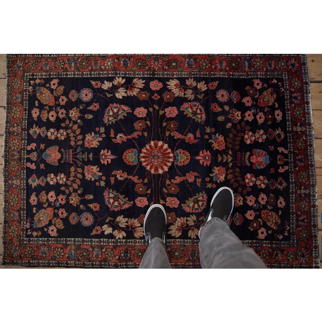 :: Roundel center floral top view with very delicate thinned long stemmed vines finished in ornate oversize blossoms...