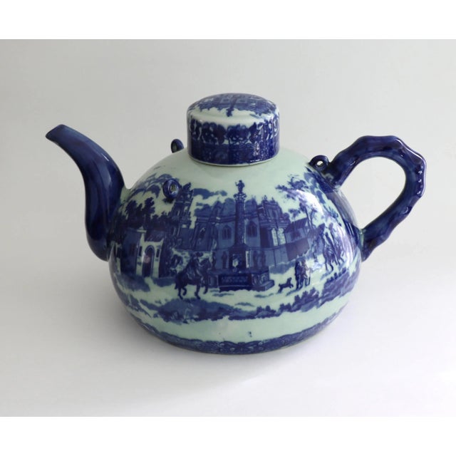 Very large, blue and white Victoria Wear teapot with matching lid and bamboo style handle. Fully marked, made by Victoria...