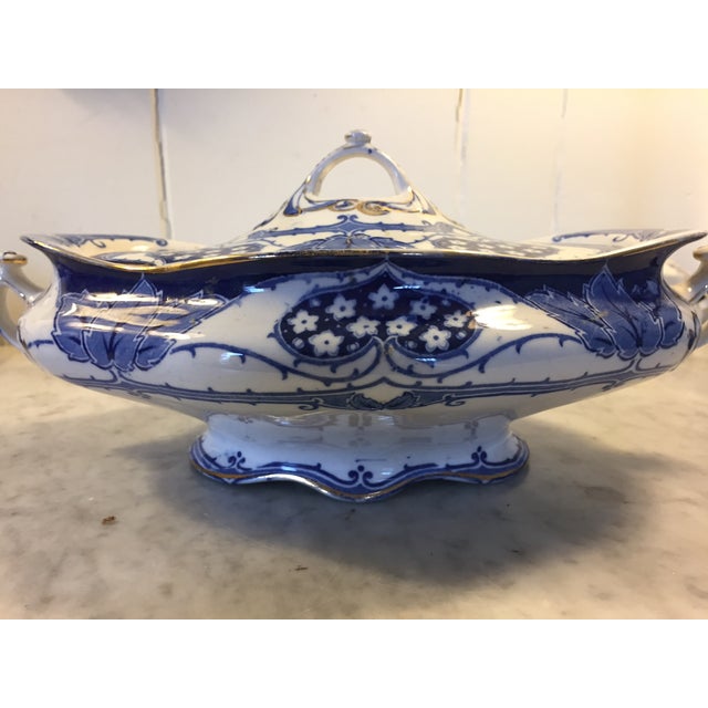 Antique lidded vegetable bowl in transferware,blue and white,Flo-blue, by the Keeling Co in England. Excellent condition.