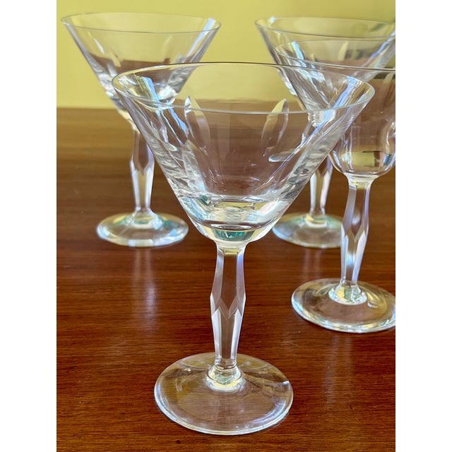 Add classic mid-century elegance to your home bar with this exceptional set of four vintage Waterford crystal cocktail...