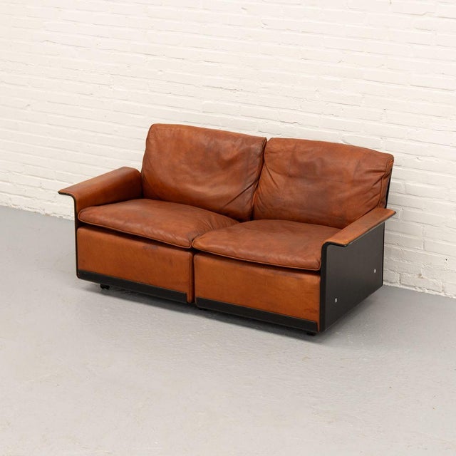 Two-seat sofa from the 620 Chair Programme, designed by Dieter Rams for Vitsœ in 1962. The sofa consists of two connected...