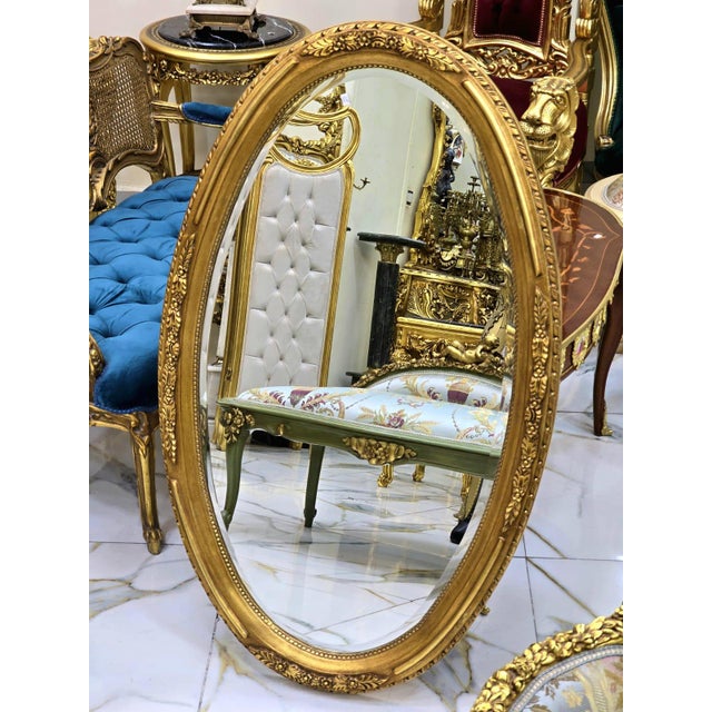 French Oval Wall Mirror With Floral Center Detail & Gold Leaf Frame For Sale - Image 3 of 5
