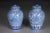 Pair of Asian lidded vases, porcelain, 20th century. Porcelain, blue painting with Asian design. Bulbous body with a...