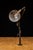 Industrial articulating task lamp designed for permanent mounting to the edge or surface of a workbench, drafting table,...