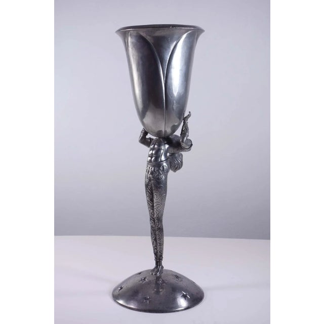 "Acrobat" Piero Figura late 20th Century Etain 95% Turbaned acrobat supporting a vase on his chest Domed base with star...