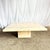 This vintage Italian travertine square top coffee table is a timeless study in material, proportion, and restraint....