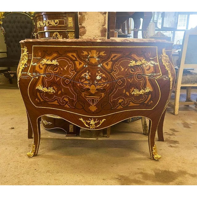 Stunning French commode. Has a beautiful gold details. This piece is in great condition and ready for everyday use....