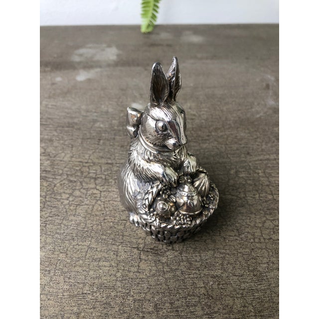 Beautiful Reed & Barton easter bunny musical figurine. Plays " Here Comes Peter Cottontail" This silver plate bunny has...