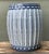 Enhance your indoor or outdoor living space with this striking blue and white ceramic garden stool. This contemporary take...