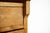 This antique cabinet was manufactured in England in first half of the 20th century. It is made from solid oak wood. It has...