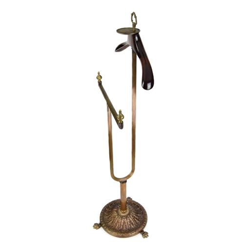 Gentleman’s valet stand, mid-20th century, made in France in the style of Maison Jansen. An exquisite bronze valet stand...