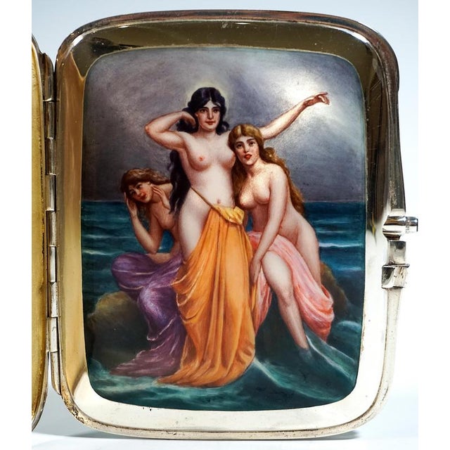 Rectangular silver cigarette case in a grooved, guilloché finish with a double lid: Beneath the outer lid, a further cover...