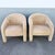 Striking pair of vintage Postmodern lounge chairs featuring dramatic sculptural silhouettes and soft tan velvet...