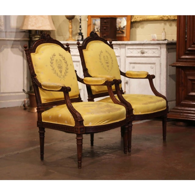 Wood Pair of 19th Century French Louis XVI Walnut Fauteuils With Eagle Crest For Sale - Image 7 of 10