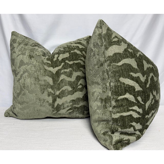 Custom pair of 22" pillows covered in an olive green chenille in a tiger pattern. These pillows have tapered corners to...